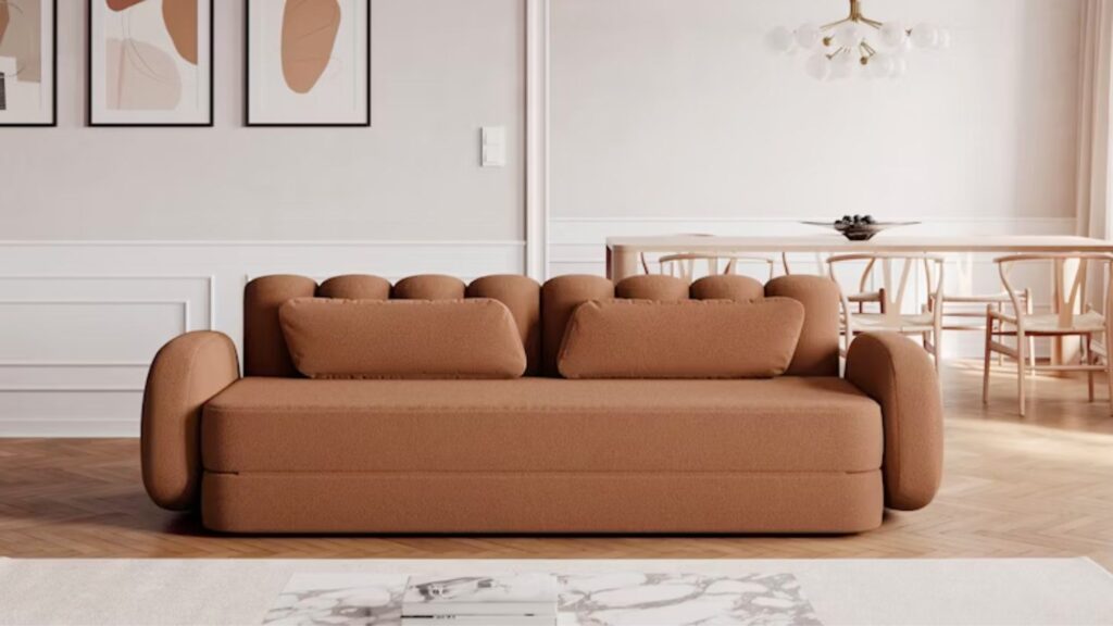 Deco Boucle sovesofa i rust som står i en stue