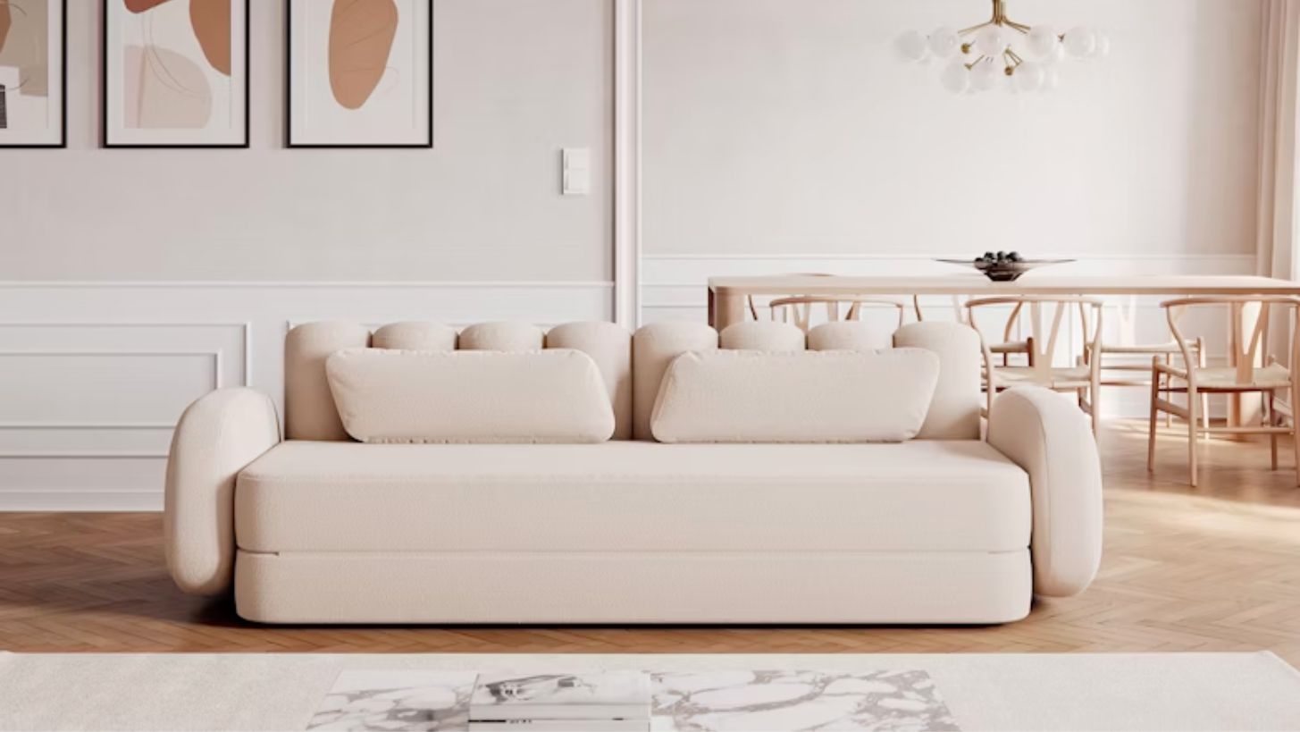 Deco Boucle sovesofa i beige som står i en stue